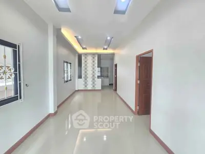 Spacious modern interior with sleek design and ample natural light, perfect for contemporary living.