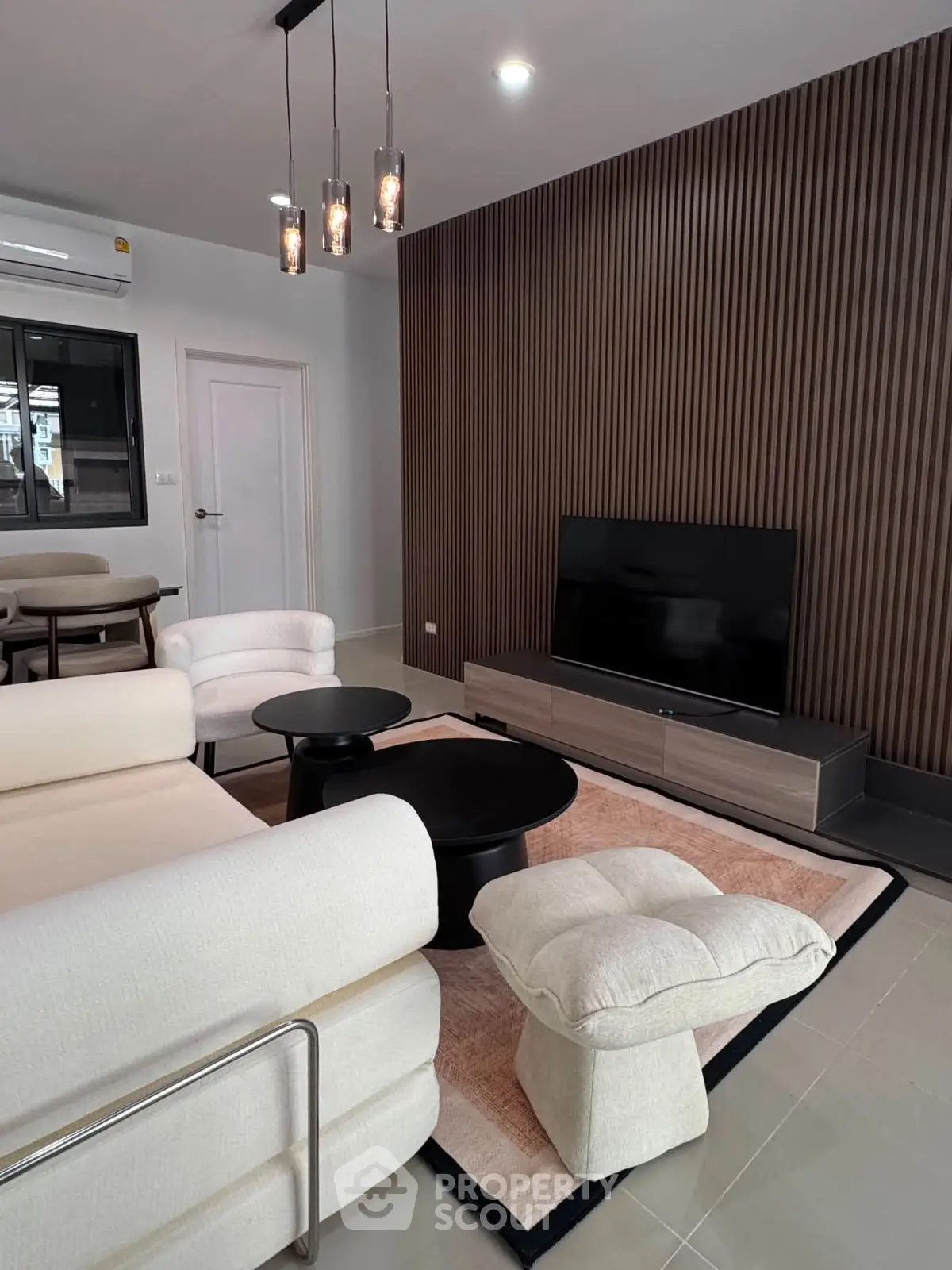 Modern living room with stylish furniture and elegant lighting