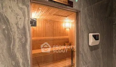 Luxurious sauna room with wooden interior and ambient lighting