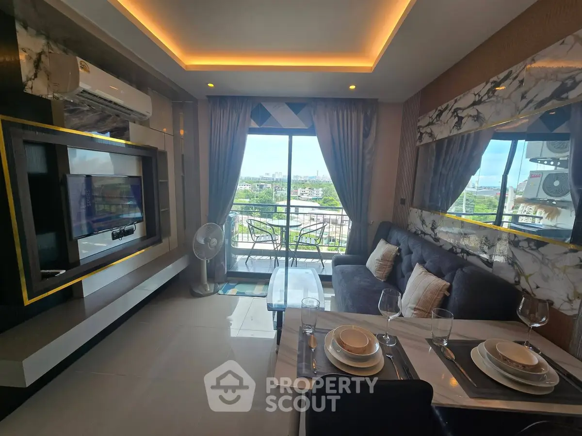 Modern living room with balcony view, stylish decor, and dining area in a luxurious apartment.