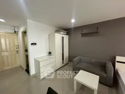 Modern living room with sleek furniture and neutral tones, perfect for urban living.