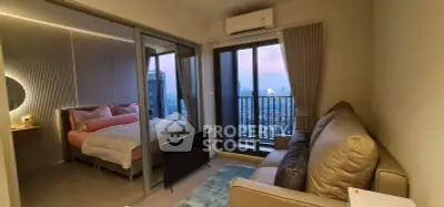 Modern apartment with cozy bedroom and city view balcony