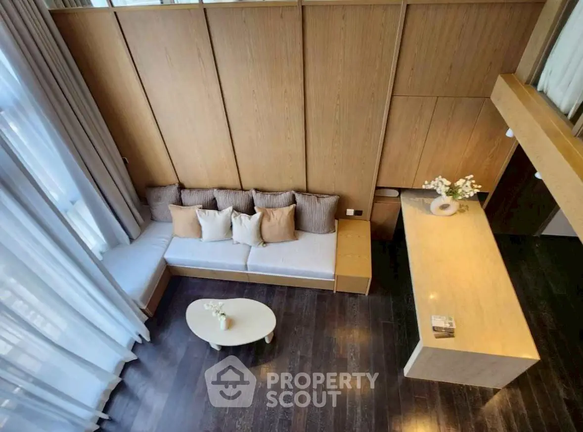 Modern living room with high ceilings and elegant decor