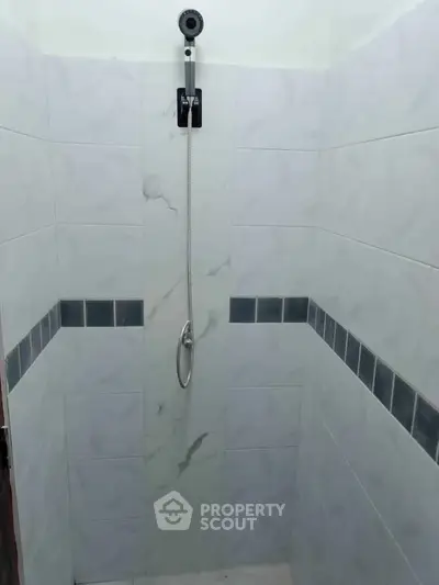 Modern minimalist bathroom shower with sleek tile design