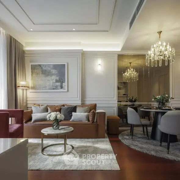 Luxurious living room with elegant decor, plush seating, and a stunning chandelier, perfect for sophisticated living.