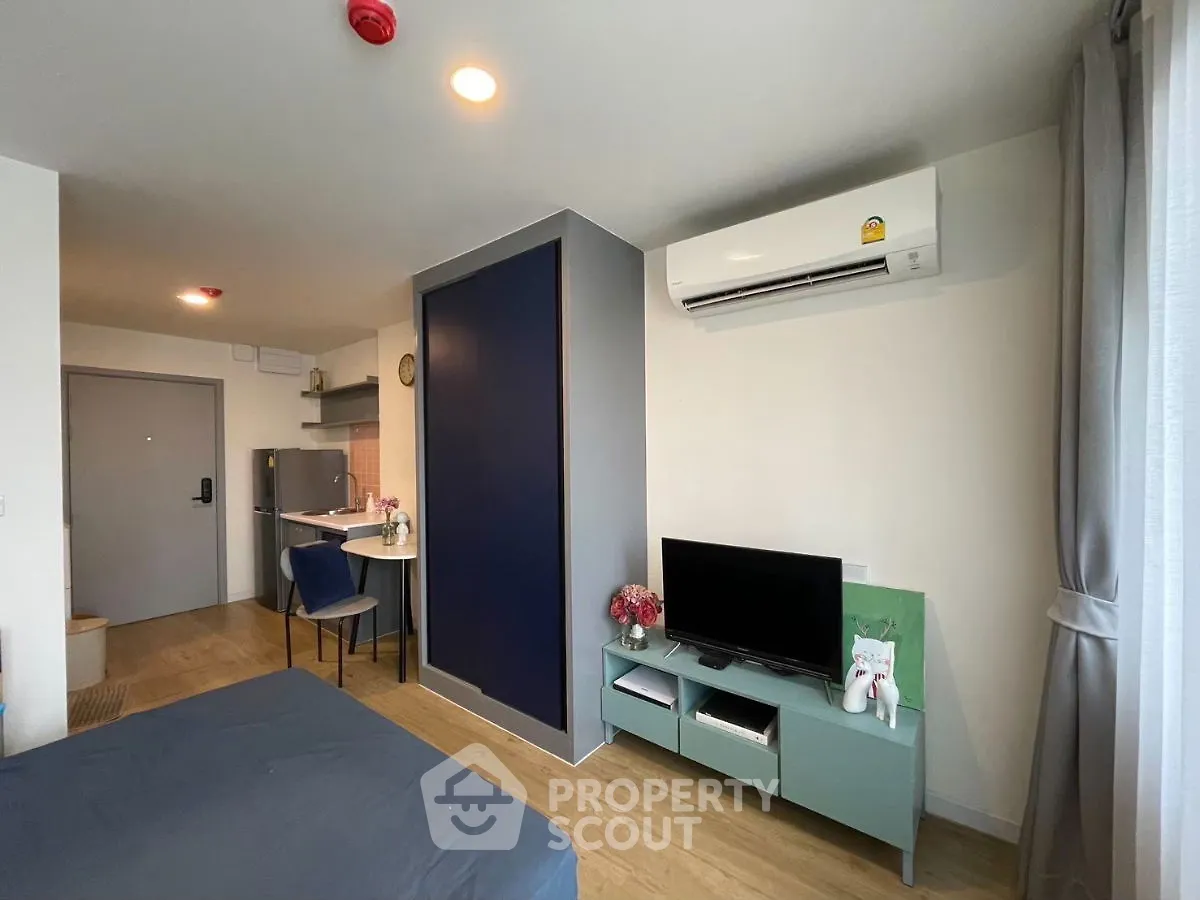 Modern studio apartment with air conditioning and stylish decor