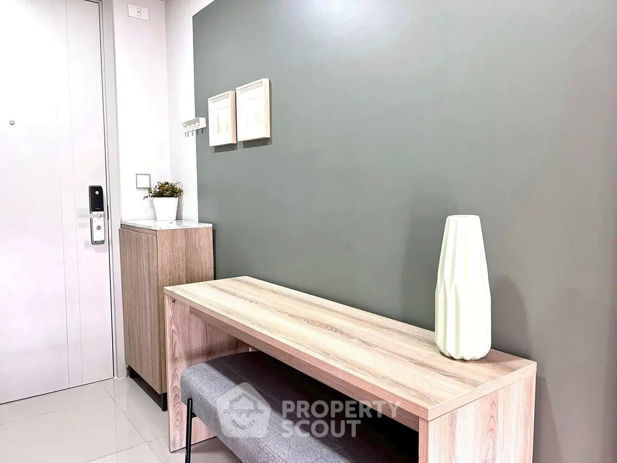 Modern entryway with sleek bench and minimalist decor