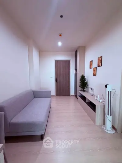 Modern living room with sleek furniture and minimalist decor, perfect for urban living.