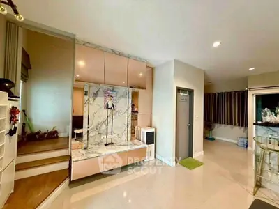 Spacious modern living room with marble accents and elegant decor