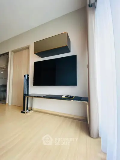 Modern living room with sleek TV setup and stylish decor