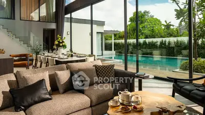 Luxurious living room with pool view, modern furniture, and elegant dining area in a contemporary home.