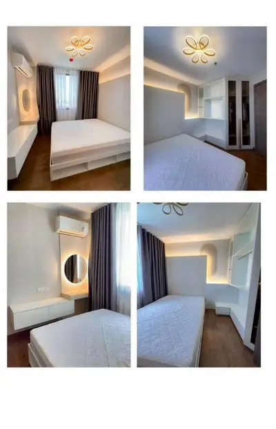 Modern bedroom with stylish lighting and built-in storage solutions