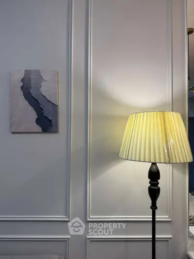 Elegant interior with stylish wall paneling and a classic floor lamp, perfect for modern living spaces.