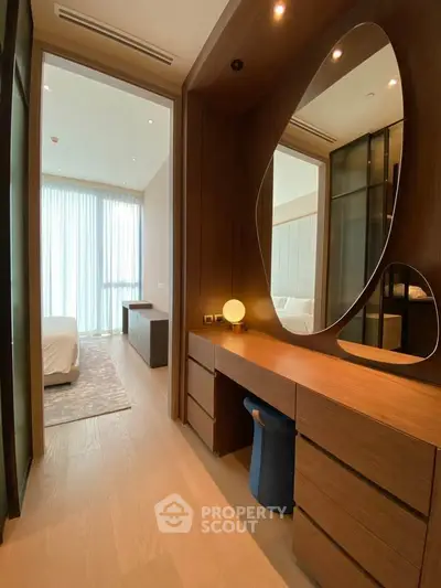 Luxurious bedroom with elegant wooden vanity and modern decor