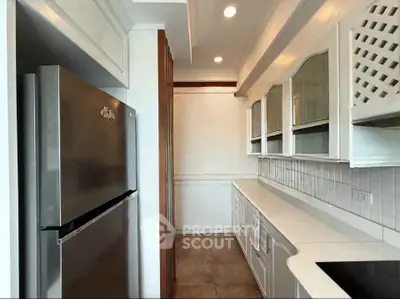 Sleek kitchen with modern appliances and elegant cabinetry