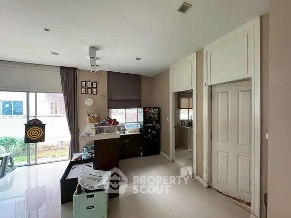 Spacious kitchen with modern design and ample natural light.