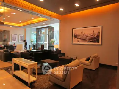 Luxurious modern living room with elegant seating and ambient lighting