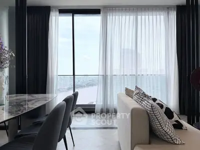 Luxurious living room with stunning city view and elegant decor