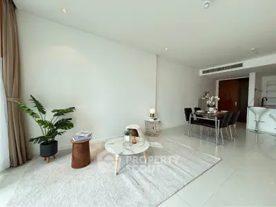 Spacious modern living room with elegant dining area and stylish decor