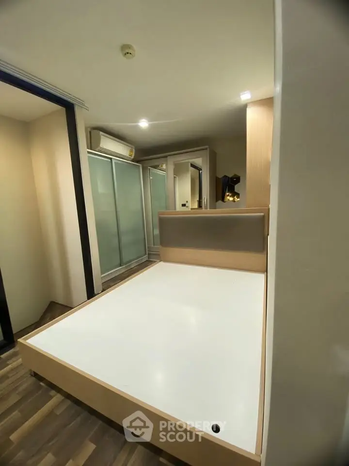 Modern bedroom with sleek design and built-in storage solutions
