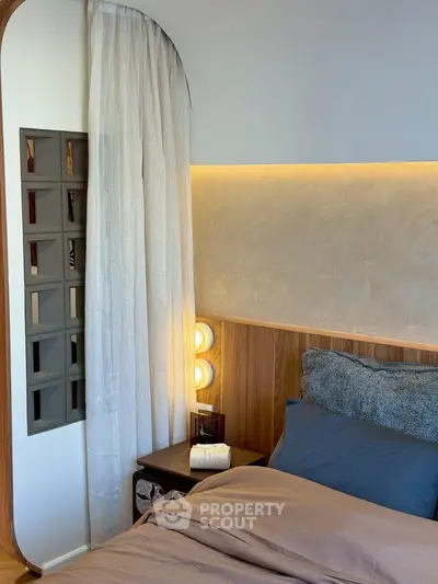 Stylish modern bedroom with cozy lighting and elegant decor