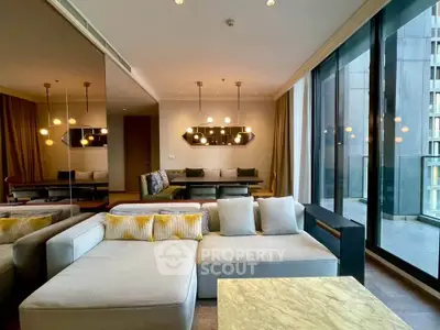 Luxurious modern living room with floor-to-ceiling windows and elegant lighting