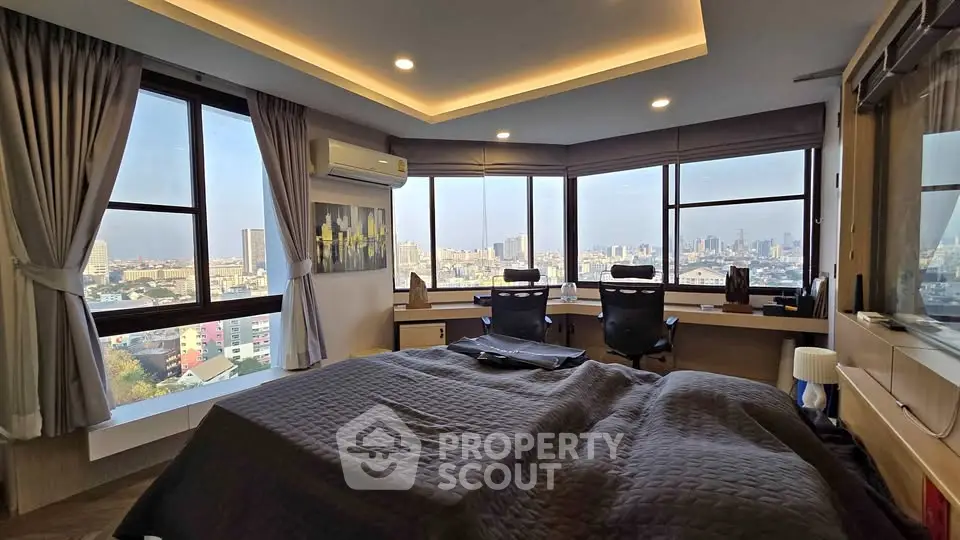 Luxurious bedroom with panoramic city view and modern decor