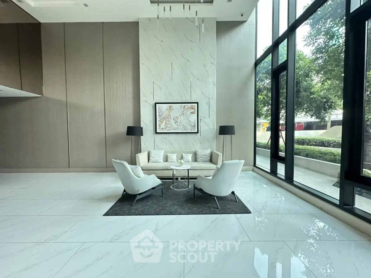 Luxurious modern living room with high ceilings and large windows