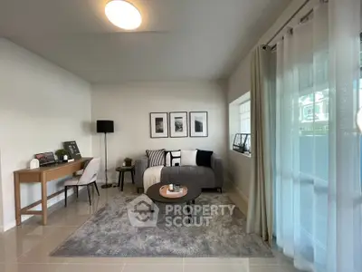 Modern living room with cozy decor and natural light