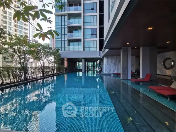 Luxurious condominium with stunning pool and modern architecture