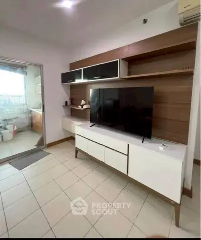 Modern living room with sleek TV unit and open layout