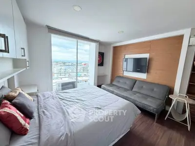 Modern bedroom with city view, featuring stylish decor and a cozy atmosphere.