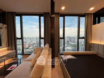 Luxurious high-rise apartment with stunning city skyline views and modern interior design.