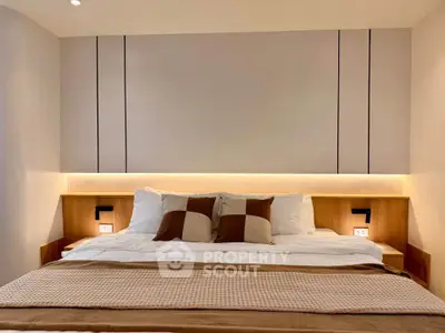 Luxurious bedroom with modern design and cozy lighting