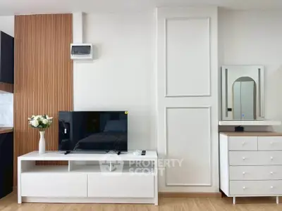 Modern living room with sleek TV stand and elegant decor
