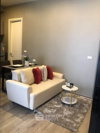 Modern living room with cozy sofa and stylish decor