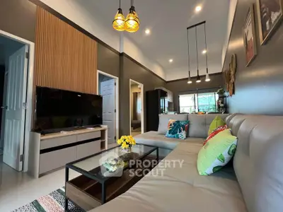 Modern living room with stylish decor and cozy seating area