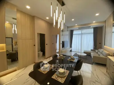 Luxurious modern living room with elegant dining area and stylish lighting