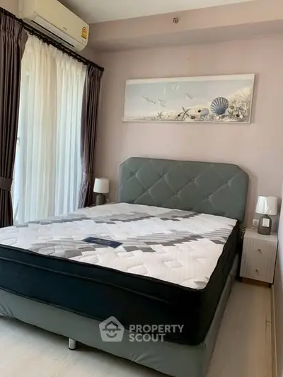 Cozy bedroom with modern decor and natural light
