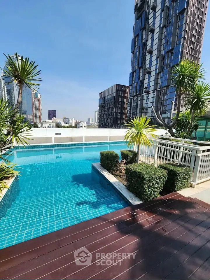 Luxurious rooftop pool with stunning city views and modern architecture.