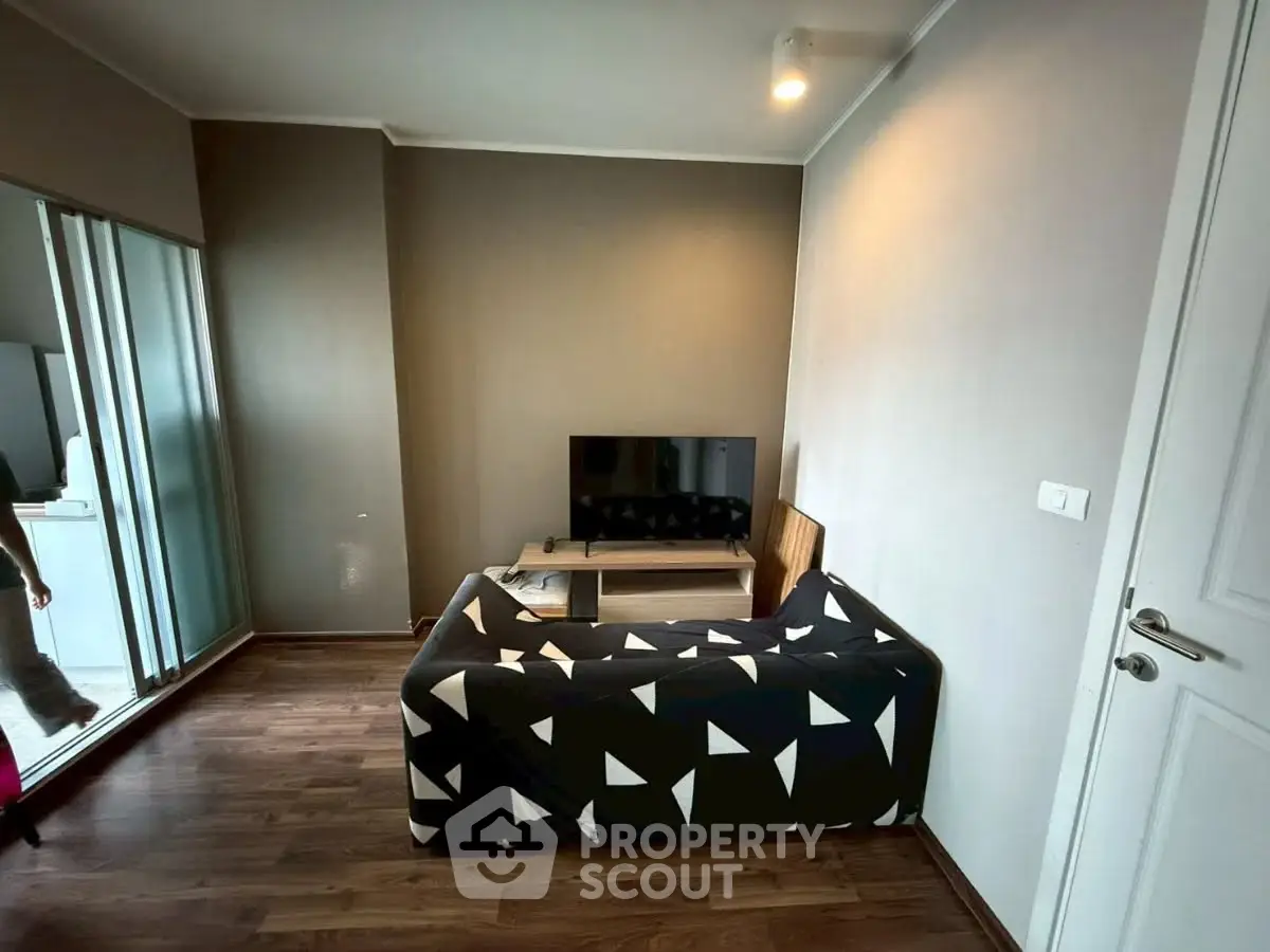 Cozy living room with modern decor and wooden flooring