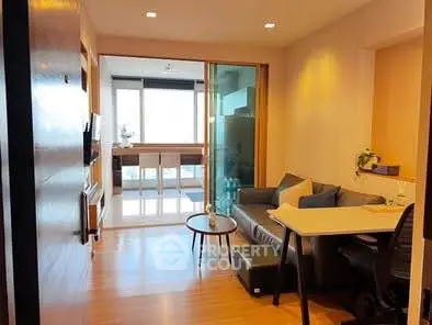 Modern living room with open layout and stylish furniture, perfect for urban living.