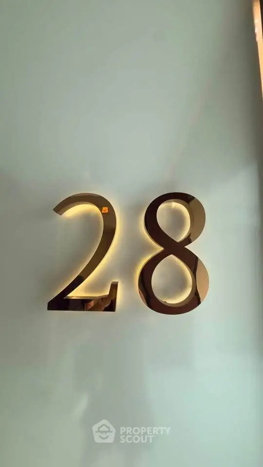 Modern apartment number 28 with sleek design and ambient lighting