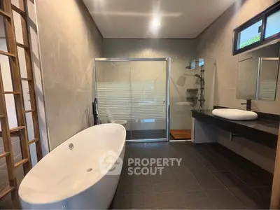 Luxurious modern bathroom with elegant bathtub and sleek shower design