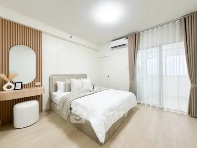 Modern minimalist bedroom with cozy decor and natural light