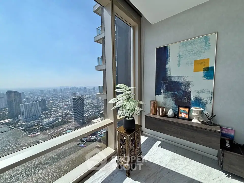 Stunning high-rise apartment with panoramic city views and elegant interior decor.