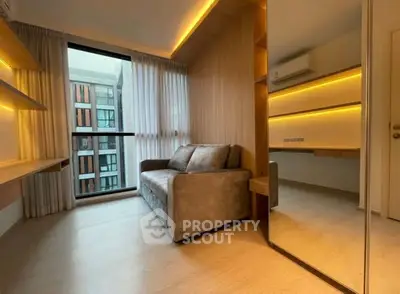 Modern living room with cozy sofa and floor-to-ceiling window in stylish apartment.