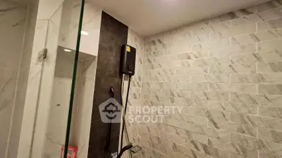 Modern bathroom with sleek shower design and elegant tile work