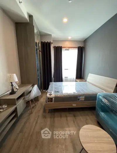 Modern bedroom with stylish furniture and natural light