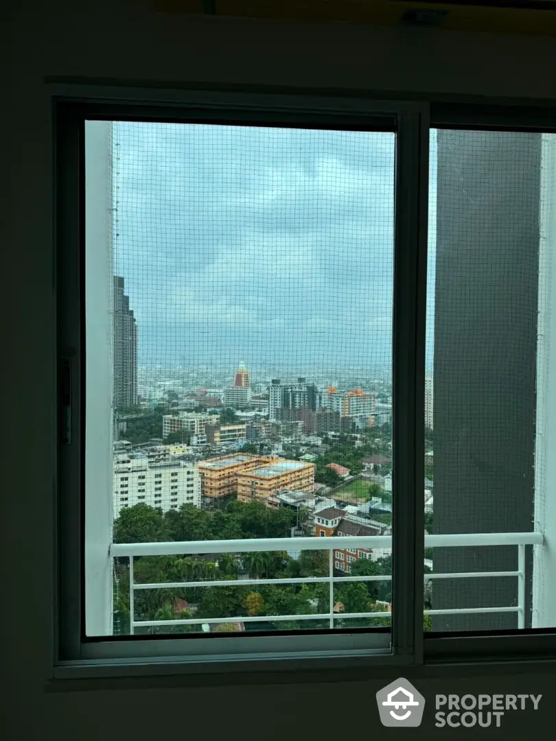 Stunning cityscape view from high-rise apartment window